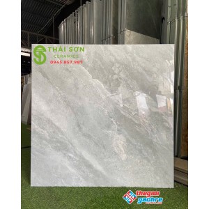 Gạch cmc 100x100 lát nền nhà vân đá xám bóng kiếng