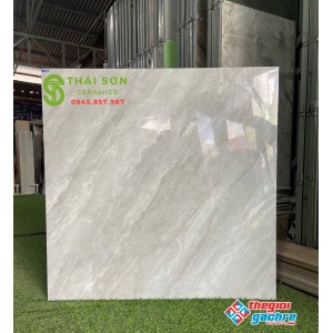 Gạch bóng kính toko 80x80 lát nền màu xám vân đá