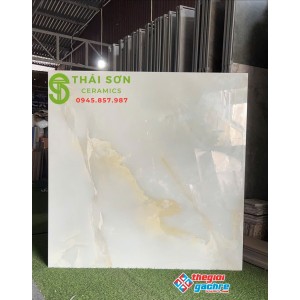 Gạch 120x120 bóng kính màu xanh vân đá