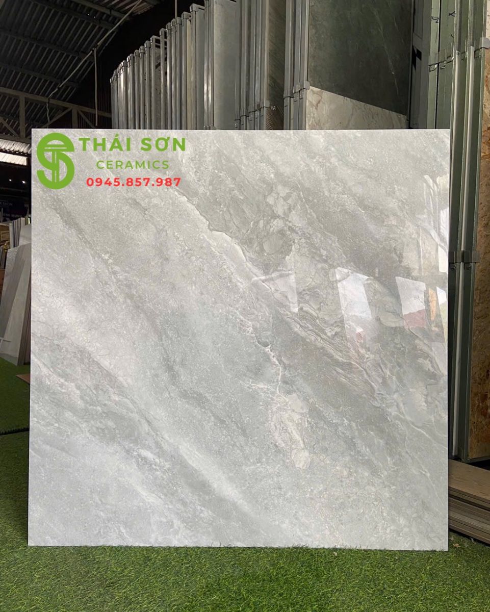 Gạch cmc 100x100 lát nền nhà vân đá xám bóng kiếng