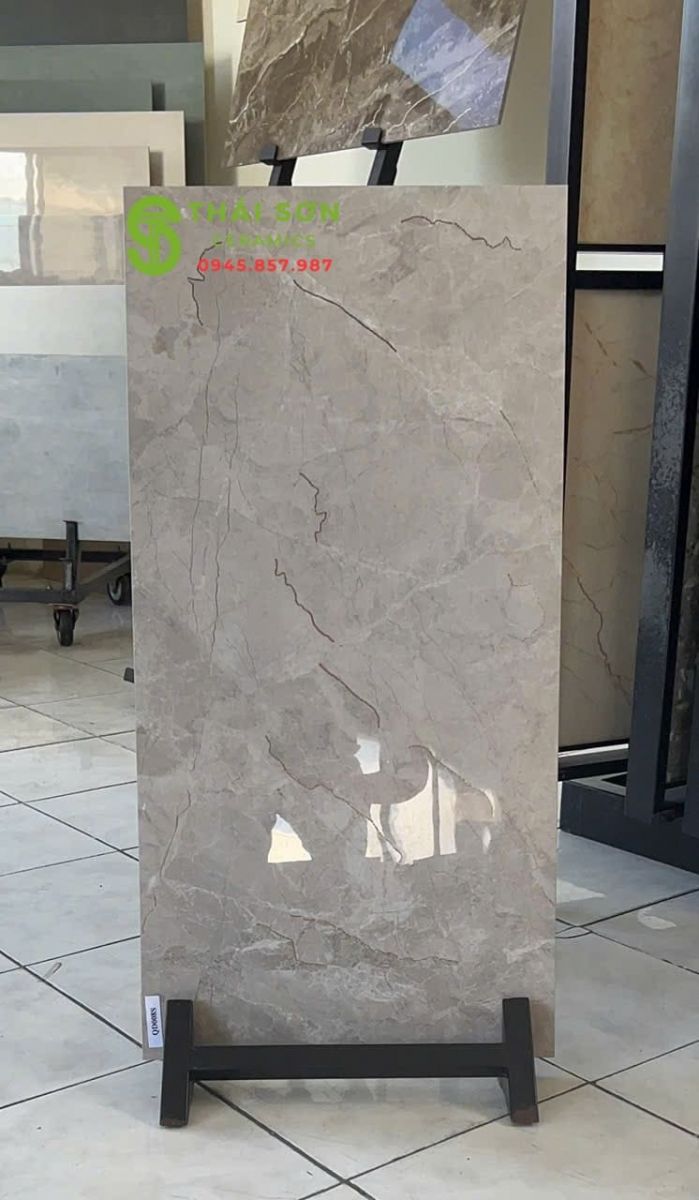 Gạch ốp tường 40x80 bóng kính khắc kim vân đá
