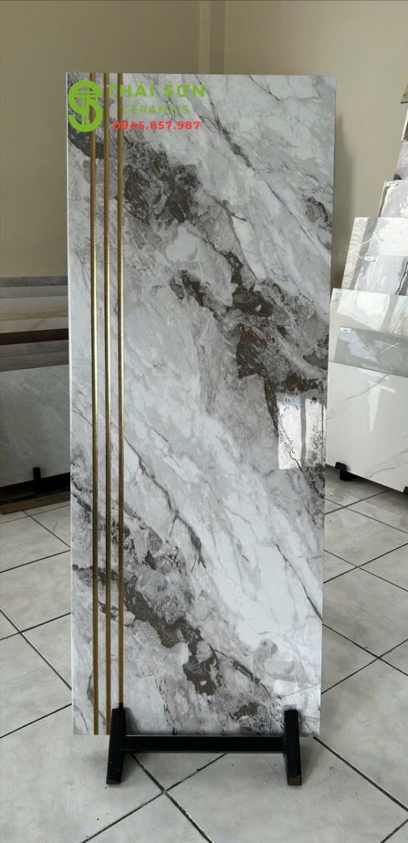 Gạch cầu thang 47x120 màu trắng vân đá chỉ vàng