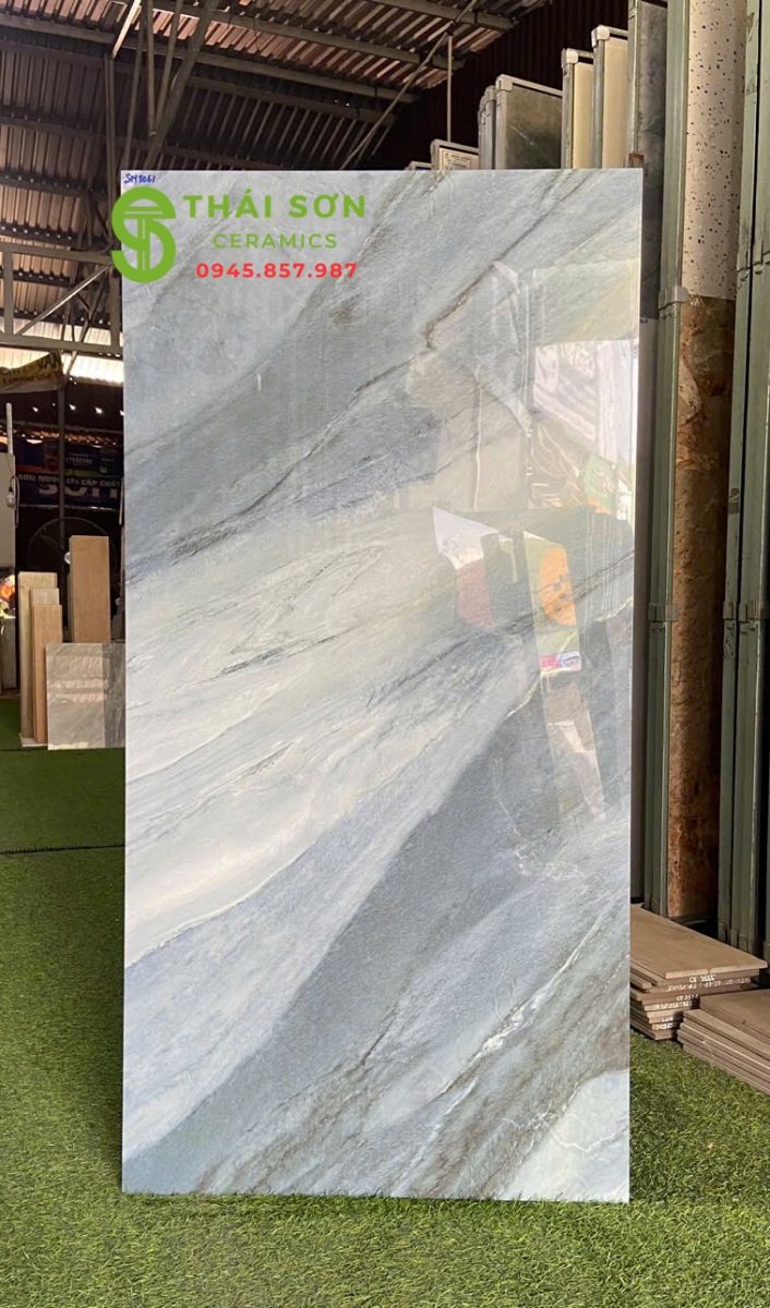 Gạch ấn độ 60x120 bóng kiếng ốp tường phòng khách vân xanh