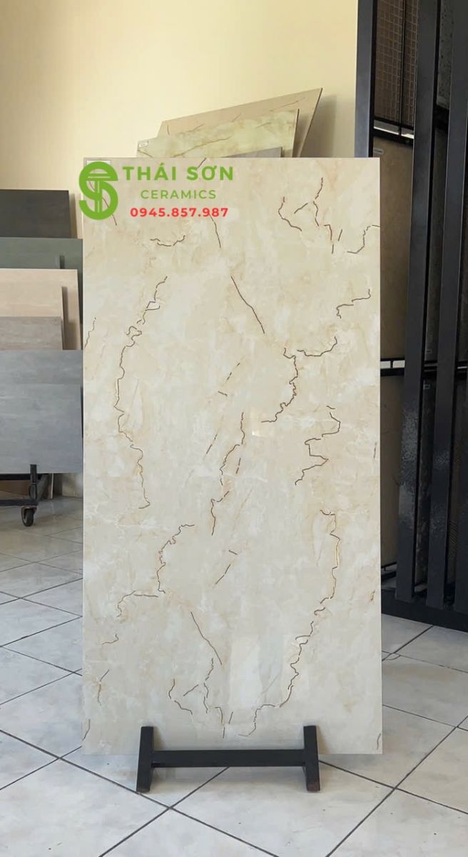 Gạch lát nền 60x120 trung quốc khắc kim màu vàng kem nhạt