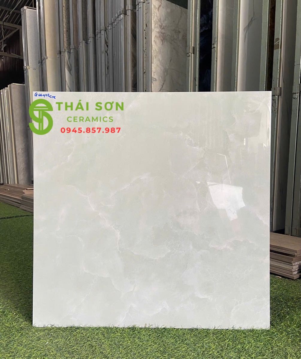 Gạch cmc lát nền 60x60 bóng kiếng màu xanh vân