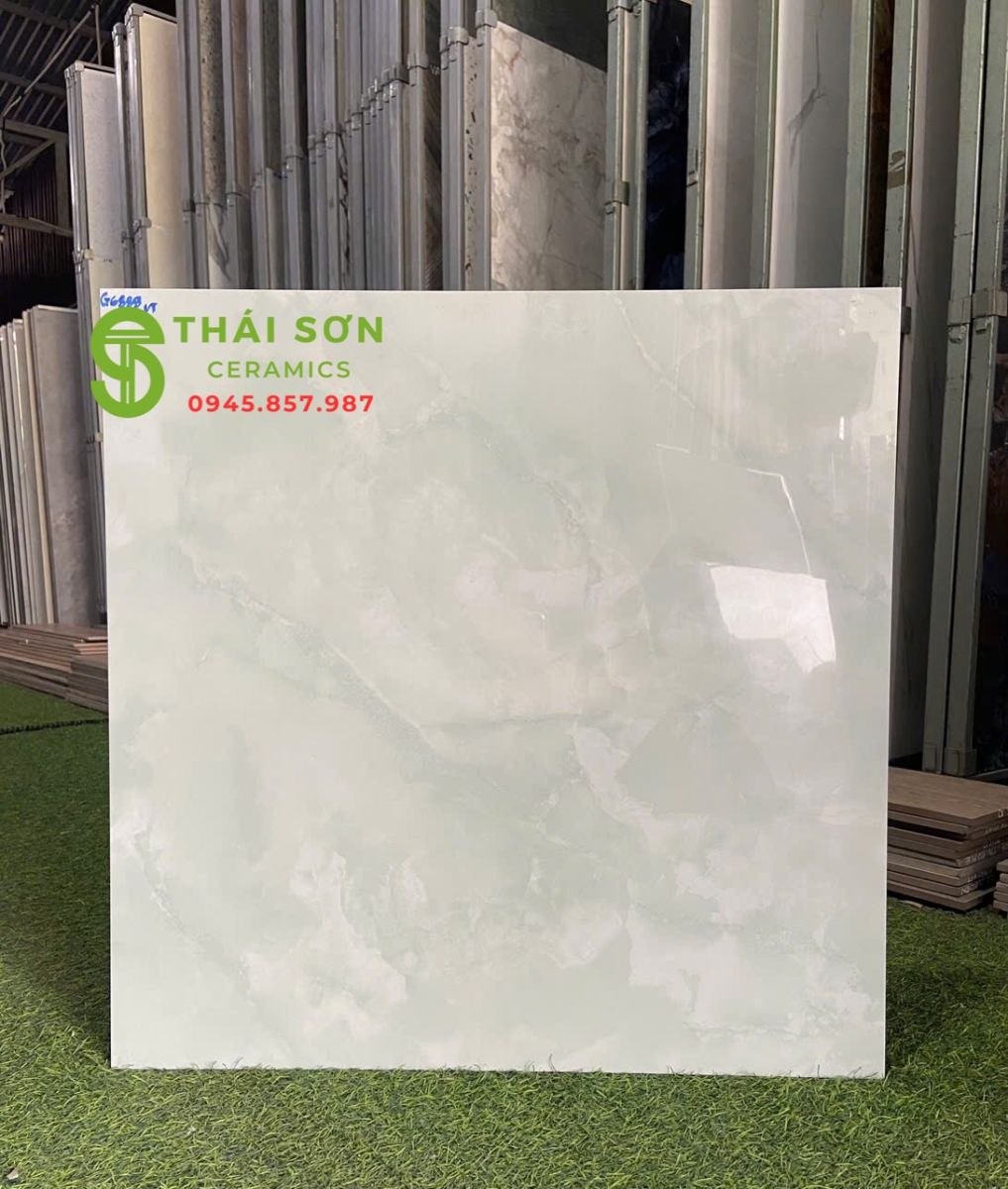 Gạch vitto hoàn mỹ bóng kiếng 60x60 lát nền nhà màu xanh