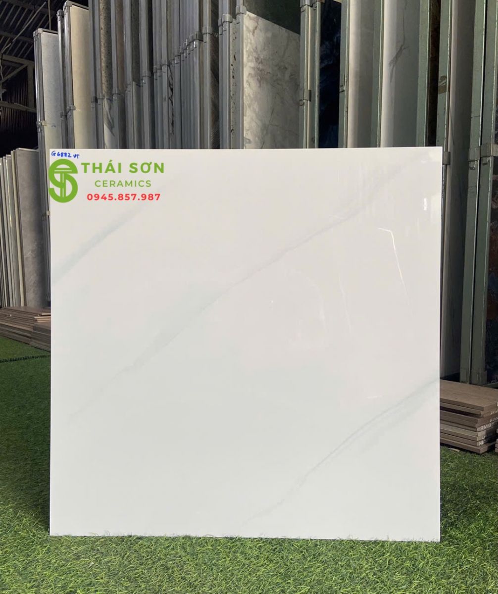 Gạch lát nền 60x60 vitto hoàn mỹ bóng kiếng trắng vân