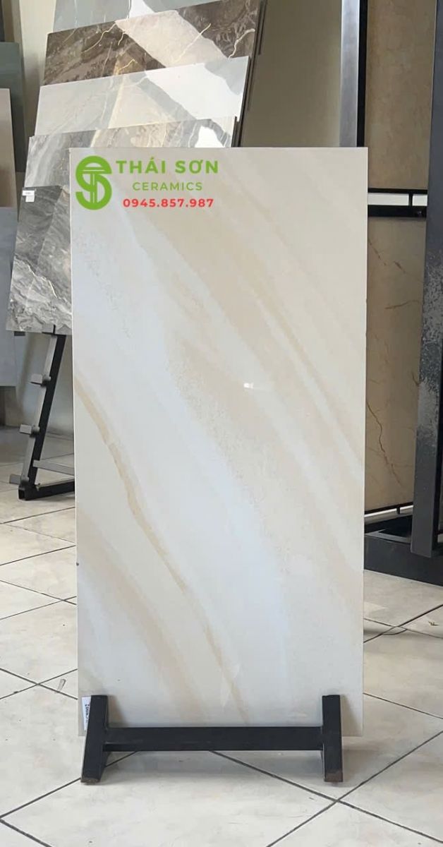 Gạch ốp tường 40x80 trung quốc bóng kiếng màu vàng kem vân đá